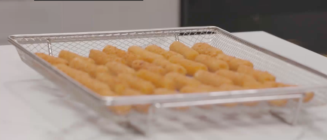 Whirlpools Culinary Training Chef, Chef Ann, explains the ease of Air Fry technology and the crispy results for dinner made easy. Air fry technology can now be found within the Whirlpool® and Maytag® cooking line-ups.